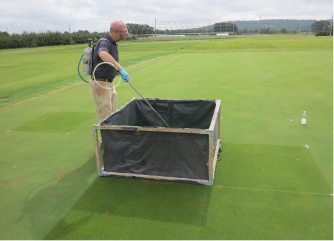 Application of treatment using a spray shield.