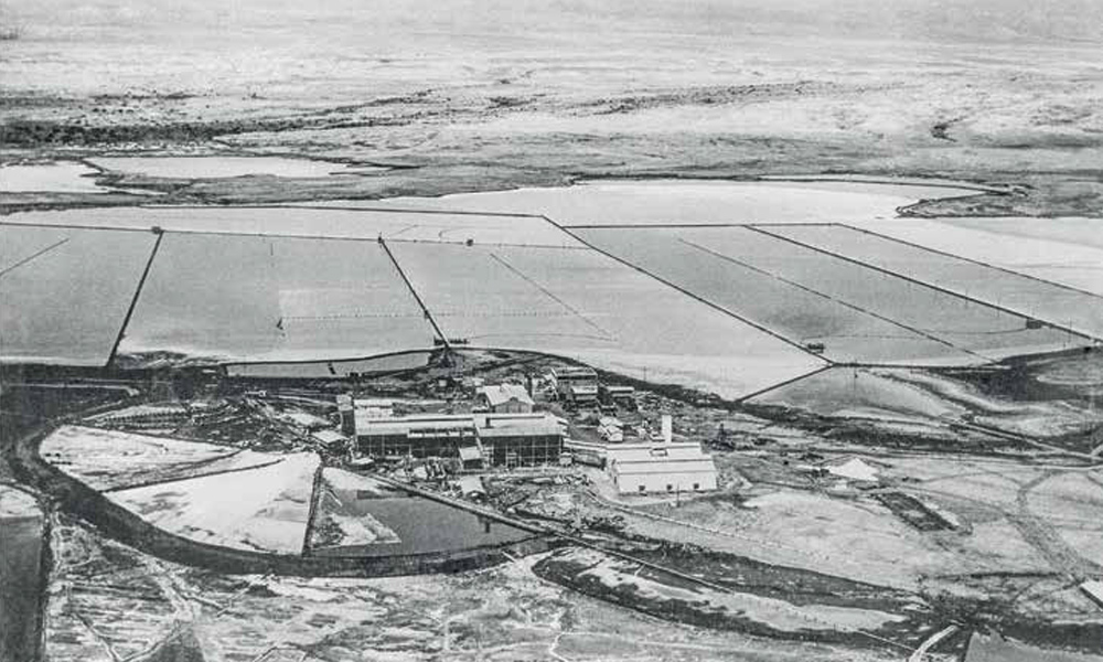 Aerial view of a potash plant and extensive evaporation ponds at Kalia in the 1930s.